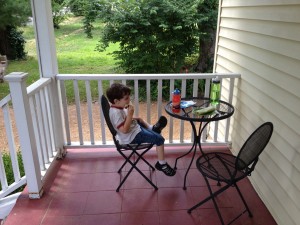 Finny eating lunch on the front porch